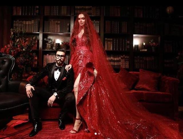 Ranveer Singh with wife Deepika Padukone at their wedding reception in Mumbai on Saturday.