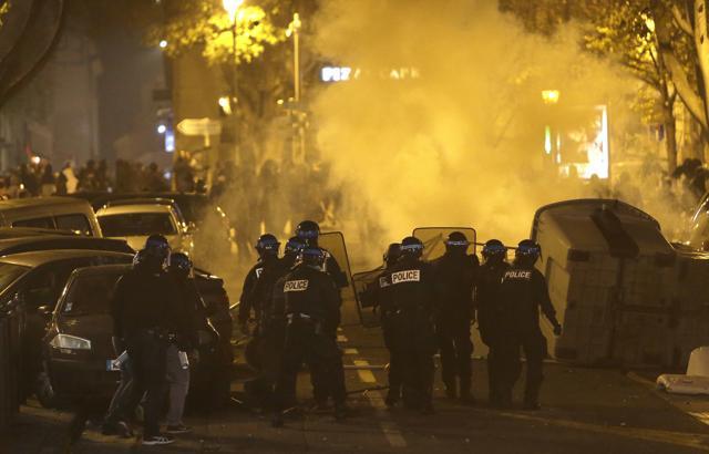 Police take position as they face demonstrators in Marseille, southern France, Saturday, Dec. 1, 2018, protesting against what they claim were dilapidated residential buildings that collapsed Monday Nov. 5, killing eight people. (AP) Police take position as they face demonstrators in Marseille, southern France, Saturday, Dec. 1, 2018, protesting against what they claim were dilapidated residential buildings that collapsed Monday Nov. 5, killing eight people. (AP)