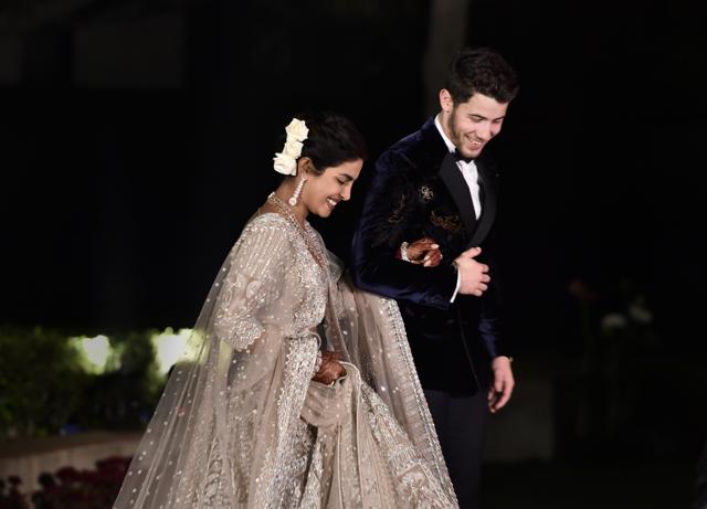 Priyanka Chopra and Nick Jonas arrive for their wedding reception. (PTI) Priyanka Chopra and Nick Jonas arrive for their wedding reception. (PTI)