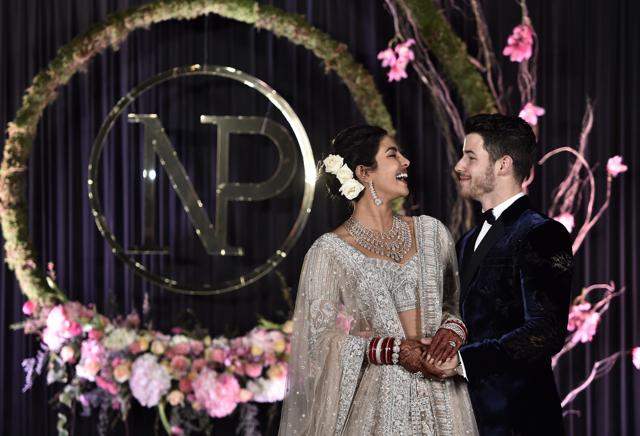 First pictures of Priyanka Chopra & Nick Jonas from their Mumbai Reception  | Priyanka chopra wedding, Asian wedding dress, Wedding reception dress