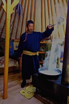 Inside a ger: Boiling milk to make cheese, yoghurt and cream. Inside a ger: Boiling milk to make cheese, yoghurt and cream.