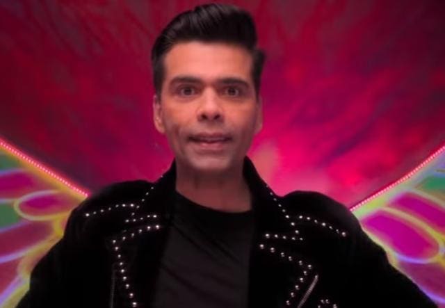 Karan Johar in a still from the song Aankh Marey. Karan Johar in a still from the song Aankh Marey.
