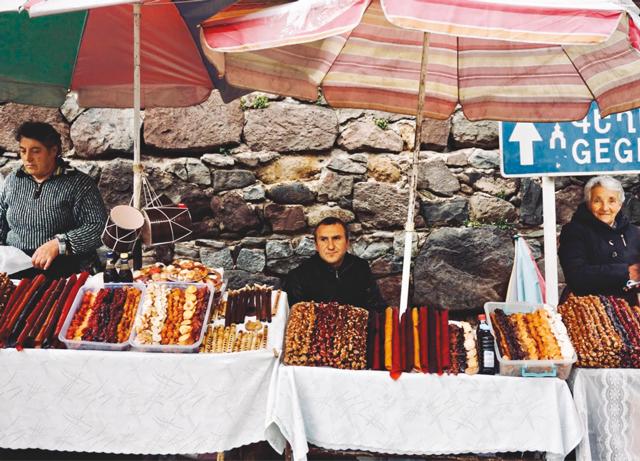 Local fruit-based produce being sold at a roadside market outside Geghard Monastery (Dhruv Jain) Local fruit-based produce being sold at a roadside market outside Geghard Monastery (Dhruv Jain)