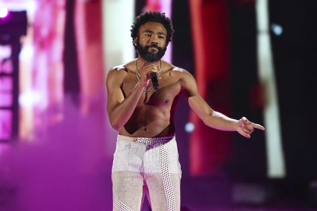 Childish Gambino performs at the 2018 iHeartRadio Music Festival Day 1 held at T-Mobile Arena in Las Vegas. (John Salangsang/Invision/AP) Childish Gambino performs at the 2018 iHeartRadio Music Festival Day 1 held at T-Mobile Arena in Las Vegas. (John Salangsang/Invision/AP)