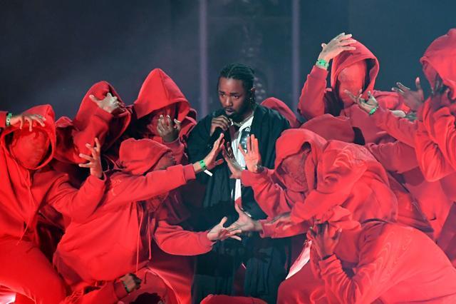 ( In this file photo taken on January 28, 2018 Kendrick Lamar performs during the 60th Annual Grammy Awards show in New York. - The soundtrack of Marvel's Black Panther propelled rap superstar Kendrick Lamar to the front of 2018's Grammy pack with eight nominations, closely followed by fellow rapper Drake who scored seven. (AFP) ( In this file photo taken on January 28, 2018 Kendrick Lamar performs during the 60th Annual Grammy Awards show in New York. - The soundtrack of Marvel's Black Panther propelled rap superstar Kendrick Lamar to the front of 2018's Grammy pack with eight nominations, closely followed by fellow rapper Drake who scored seven. (AFP)