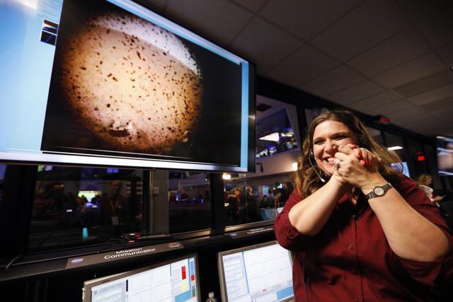 An engineer next to an image of Mars sent from the InSight lander shortly after it landed on Mars in the mission support area of the space flight operation facility at NASA's Jet Propulsion Laboratory Monday, November 26, 2018. (AP Photo) An engineer next to an image of Mars sent from the InSight lander shortly after it landed on Mars in the mission support area of the space flight operation facility at NASA's Jet Propulsion Laboratory Monday, November 26, 2018. (AP Photo)