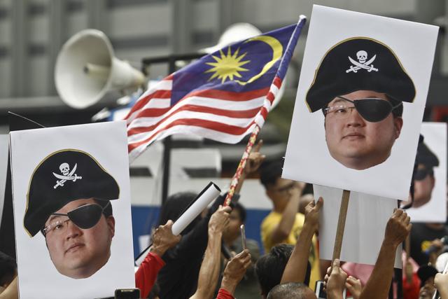 Protesters have called for Jho Low’s arrest. (AP/File Photo) Protesters have called for Jho Low’s arrest. (AP/File Photo)