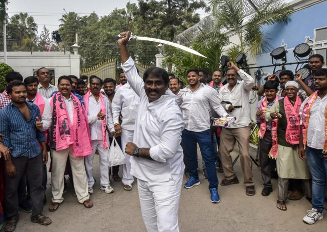 TRS supporters celebrate outside TRS Bhavan, Banjara Hills, Hyderabad, Telangana. (Kunal Patil/HT Photo) TRS supporters celebrate outside TRS Bhavan, Banjara Hills, Hyderabad, Telangana. (Kunal Patil/HT Photo)