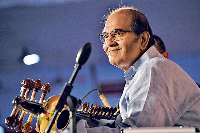 Pandit Basant Kabara plays Sarod during the first day of the 66th Sawai mahotsav at Maharashtriya mandal’s ground on Wednesday. (Sanket Wankhade/HT PHOTO)