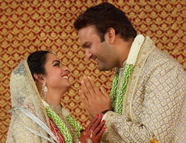 Isha Ambani with husband Anand Piramal after their wedding. (Viral Bhayani)
