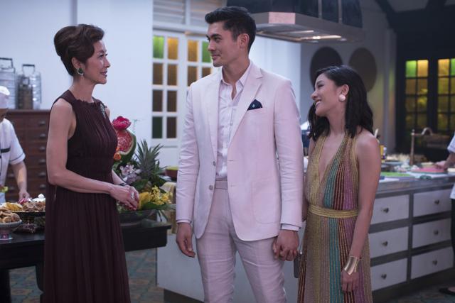 This image released by Warner Bros. Entertainment shows Michelle Yeoh, from left, Henry Golding and Constance Wu in a scene from the film Crazy Rich Asians. (AP) This image released by Warner Bros. Entertainment shows Michelle Yeoh, from left, Henry Golding and Constance Wu in a scene from the film Crazy Rich Asians. (AP)