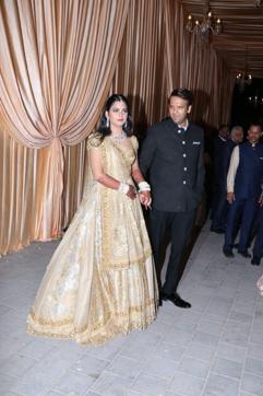 Isha Ambani and Anand Piramal arrive for their reception in Mumbai (ANI Photo) Isha Ambani and Anand Piramal arrive for their reception in Mumbai (ANI Photo)