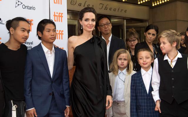 Maddox Chivan Jolie-Pitt, Pax Thien Jolie-Pitt, Angelina Jolie, Vivienne Marcheline Jolie-Pitt, Knox Leon Jolie-Pitt and Shiloh Nouvel Jolie-Pitt attend the premiere of First they Killed my Father at the Toronto International Film Festival. (AFP)