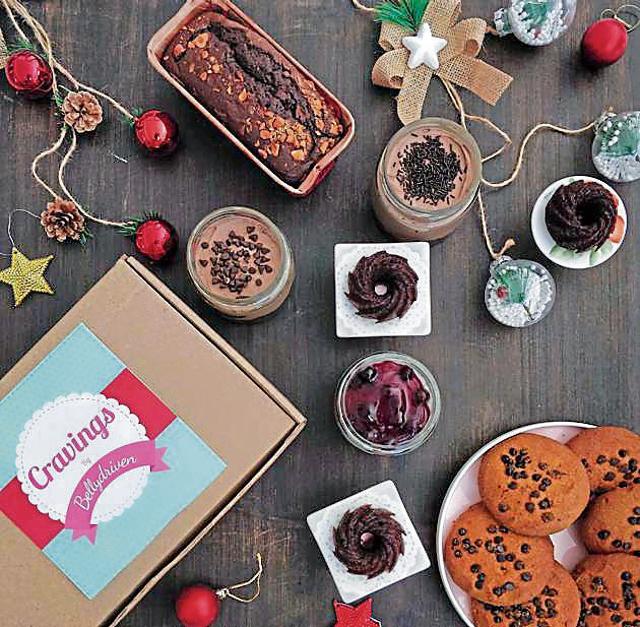 Cravings box by home baker and food blogger Monalisa Mehrotra contains delicacies such as cake jars and cookies. (HT PHOTO) Cravings box by home baker and food blogger Monalisa Mehrotra contains delicacies such as cake jars and cookies. (HT PHOTO)