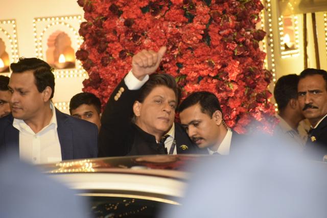 Actor Shah Rukh Khan at the wedding ceremony of industrialist Mukesh Ambani's daughter Isha Ambani and Anand Piramal at Antilia in Mumbai. (IANS) Actor Shah Rukh Khan at the wedding ceremony of industrialist Mukesh Ambani's daughter Isha Ambani and Anand Piramal at Antilia in Mumbai. (IANS)