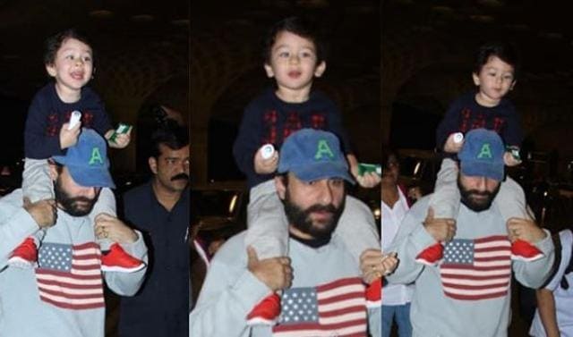 Taimur Ali Khan with his dad Saif on their way to South Africa on Sunday. (Viral Bhayani)