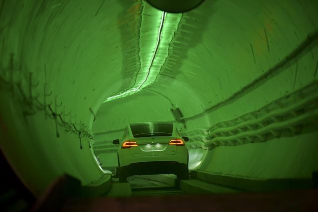 A modified Tesla Model X drives in the tunnel entrance before an unveiling event for the Boring Co. Hawthorne test tunnel in Hawthorne, California on December 18. (AP Photo) A modified Tesla Model X drives in the tunnel entrance before an unveiling event for the Boring Co. Hawthorne test tunnel in Hawthorne, California on December 18. (AP Photo)