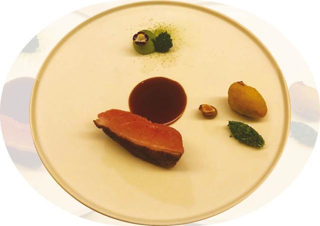 A shot of the 7-day dry-aged Hungarian Duck Breast on the bone, with a touch of pumpkin, hazelnuts and cardamom A shot of the 7-day dry-aged Hungarian Duck Breast on the bone, with a touch of pumpkin, hazelnuts and cardamom