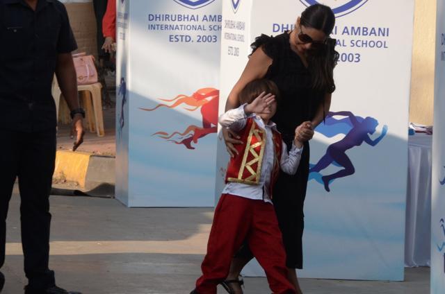 AbRam hides his face from the paparazzi. (Viral Bhayani)