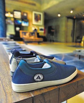 A set of indigo shoes in polyester fabric, at present an experiment, but a perfect prototype for a future commercial launch. (Biplov Bhuyan/HT PHOTO) A set of indigo shoes in polyester fabric, at present an experiment, but a perfect prototype for a future commercial launch. (Biplov Bhuyan/HT PHOTO)