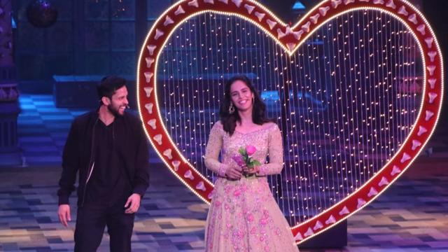 Saina Nehwal with her husband Parupalli Kashyap on Kanpur Wale Khuranas. Saina Nehwal with her husband Parupalli Kashyap on Kanpur Wale Khuranas.