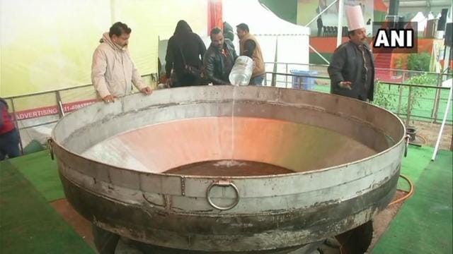 ‘Khichdi’ being cooked for BJP’s ‘Bhim Mahasangam Vijay Sankalp’ rally in Delhi’s Ram Leela Maidan later today. (ANI Photo) ‘Khichdi’ being cooked for BJP’s ‘Bhim Mahasangam Vijay Sankalp’ rally in Delhi’s Ram Leela Maidan later today. (ANI Photo)