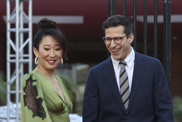 Sandra Oh (left) and Andy Samberg smile after rolling-up the red carpet at the 76th Annual Golden Globe Awards Preview Day at The Beverly Hilton in Beverly Hills. (Willy Sanjuan/Invision/AP) Sandra Oh (left) and Andy Samberg smile after rolling-up the red carpet at the 76th Annual Golden Globe Awards Preview Day at The Beverly Hilton in Beverly Hills. (Willy Sanjuan/Invision/AP)