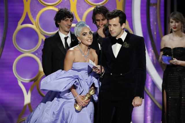 This image released by NBC shows Lady Gaga, left, and Mark Ronson accepting the award for best original song for Shallow during the 76th Annual Golden Globe Awards at the Beverly Hilton Hotel on Sunday. (AP) This image released by NBC shows Lady Gaga, left, and Mark Ronson accepting the award for best original song for Shallow during the 76th Annual Golden Globe Awards at the Beverly Hilton Hotel on Sunday. (AP)
