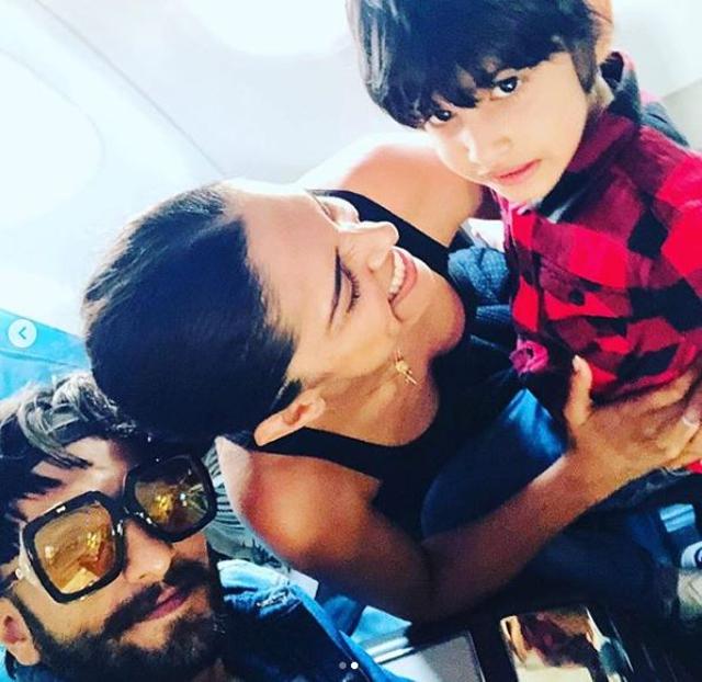 Ranveer Singh, Deepika Padukone click a selfie with a fan.