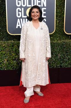 Meher Tatna in a beige Bhagalpur hand-embroidered silk coat by Abu Jani-Sandeep Khosla. (AFP PHOTO) Meher Tatna in a beige Bhagalpur hand-embroidered silk coat by Abu Jani-Sandeep Khosla. (AFP PHOTO)