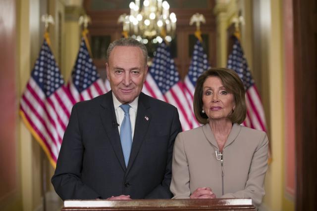 Senate Minority Leader Chuck Schumer of NY, and House Speaker Nancy Pelosi of Calif. pose for photographers after speaking on Capitol Hill in response President Donald Trump's address on Tuesday. (AP) Senate Minority Leader Chuck Schumer of NY, and House Speaker Nancy Pelosi of Calif. pose for photographers after speaking on Capitol Hill in response President Donald Trump's address on Tuesday. (AP)