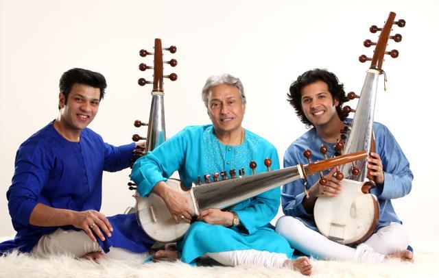 Sarod player Amjad Ali Khan Bangash (centre) with his sons, Amaan Ali Bangash and Ayaan Ali Bangash, who also play the sarod. Sarod player Amjad Ali Khan Bangash (centre) with his sons, Amaan Ali Bangash and Ayaan Ali Bangash, who also play the sarod.