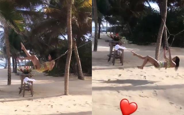 Nick Jonas clicks Priyanka Chopra as she enjoys her swing ride.