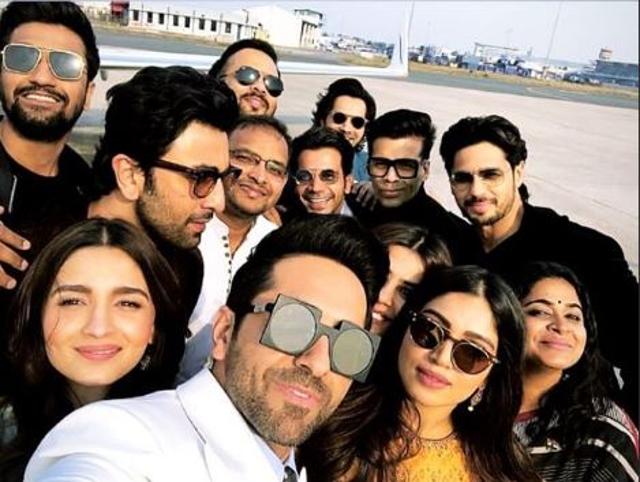 The delegation clicks a selfie at the airport.