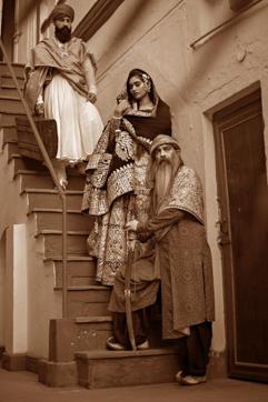 Wearing an elegant printed asymmetrical kurta with an embroidered floral shawl and patialas, the revolutionary chieftain sees off the bride and groom at the crack of dawn. He will ensure that no harm befalls them. He is a man who would give his life to keep his word. (Photo: Jasjeet Plaha/HT ) Wearing an elegant printed asymmetrical kurta with an embroidered floral shawl and patialas, the revolutionary chieftain sees off the bride and groom at the crack of dawn. He will ensure that no harm befalls them. He is a man who would give his life to keep his word. (Photo: Jasjeet Plaha/HT )