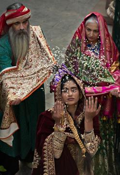 She has the blessings of a rebel warrior. No harm can come her way. As she tosses a handful of rice backwards, she knows she’ll do fine as she embarks on the most special journey of her life (Photo: Jasjeet Plaha/HT ) She has the blessings of a rebel warrior. No harm can come her way. As she tosses a handful of rice backwards, she knows she’ll do fine as she embarks on the most special journey of her life (Photo: Jasjeet Plaha/HT )