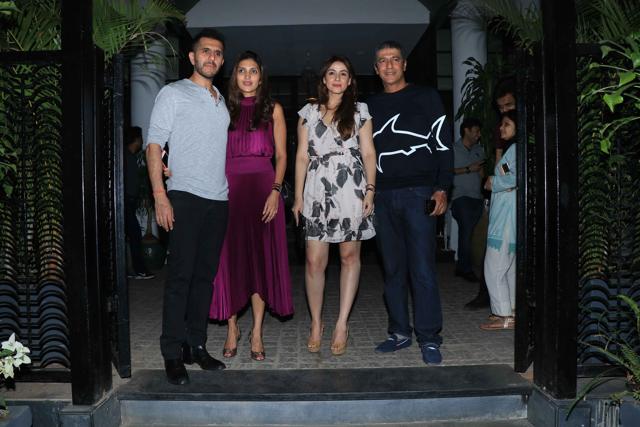 Ritesh Sidhwani and Chunky Pandey with their wives at the party. (Viral Bhayani) Ritesh Sidhwani and Chunky Pandey with their wives at the party. (Viral Bhayani)