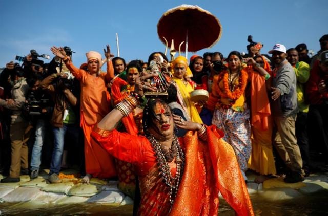 Laxmi Narayan Tripathi, chief of the Kinnar Akhara congregation for transgender people takes a dip during the first Shahi Snan during Kumbh Mela. (REUTERS) Laxmi Narayan Tripathi, chief of the Kinnar Akhara congregation for transgender people takes a dip during the first Shahi Snan during Kumbh Mela. (REUTERS)