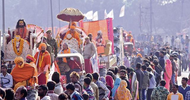 Many seers and saints at the ongoing Kumbh Mela can be spotted giving sermons, performing religious rituals and even taking a dip in the Ganga, all under security cover. (HT Photo ) Many seers and saints at the ongoing Kumbh Mela can be spotted giving sermons, performing religious rituals and even taking a dip in the Ganga, all under security cover. (HT Photo )