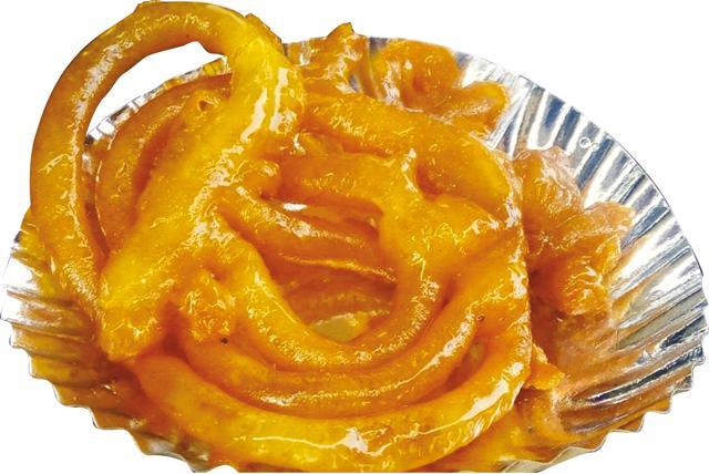 The fat golden juicy jalebi of Old Delhi is a gift from Syria, the guide says, the “invaders” brought it with them The fat golden juicy jalebi of Old Delhi is a gift from Syria, the guide says, the “invaders” brought it with them
