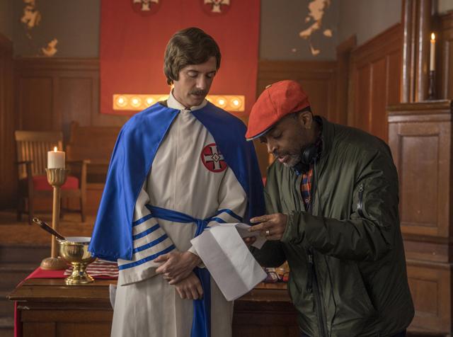 This image released by Focus features shows Topher Grace, left, with director Spike Lee on the set of BlacKkKlansman (AP) This image released by Focus features shows Topher Grace, left, with director Spike Lee on the set of BlacKkKlansman (AP)