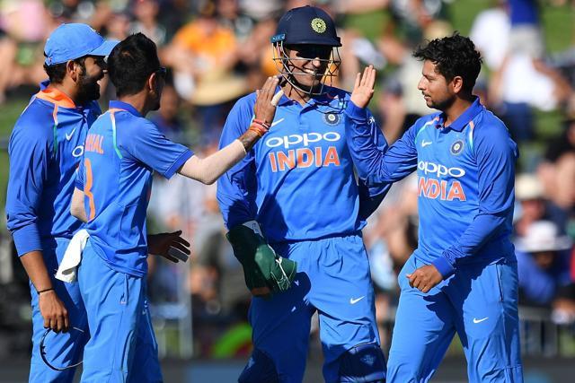India's Kuldeep Yadav (R), Yuzvendra Chahal (front L) and wicketkeeper Mahendra Singh Dhoni (C) celebrate after New Zealand's Lockie Ferguson was stumped. (AFP) India's Kuldeep Yadav (R), Yuzvendra Chahal (front L) and wicketkeeper Mahendra Singh Dhoni (C) celebrate after New Zealand's Lockie Ferguson was stumped. (AFP)