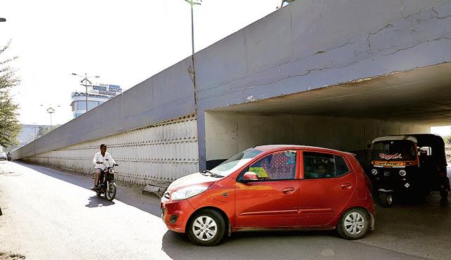 The residents now have to use the Mundhwa flyover or the tunnel under the flyover in order to enter into the society. (Rahul Raut/HT PHOTO) The residents now have to use the Mundhwa flyover or the tunnel under the flyover in order to enter into the society. (Rahul Raut/HT PHOTO)