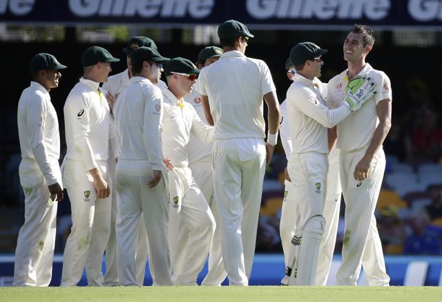 Pat Cummins, right, celebrates with his teammates after he got the wicket of Roshen Silva. (AP) Pat Cummins, right, celebrates with his teammates after he got the wicket of Roshen Silva. (AP)