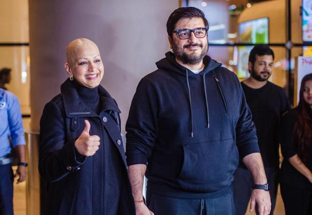Sonali Bendre with her husband Goldie Behl on their arrival in Mumbai. (PTI) Sonali Bendre with her husband Goldie Behl on their arrival in Mumbai. (PTI)