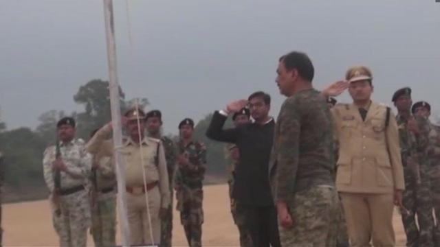 The Police and District Administration officials waded through water to hoist the Tricolour on the banks of river Indravati. (ANI Photo/Twitter) The Police and District Administration officials waded through water to hoist the Tricolour on the banks of river Indravati. (ANI Photo/Twitter)