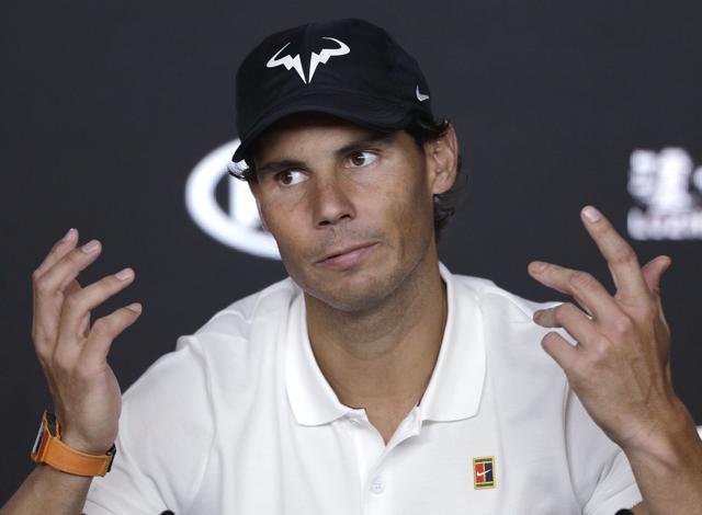 Rafael Nadal gestures at a press conference after losing to Serbia's Novak Djokovic. (AP) Rafael Nadal gestures at a press conference after losing to Serbia's Novak Djokovic. (AP)