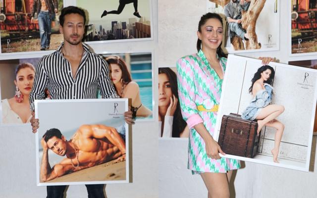 Tiger Shroff and Kiara Advani with their calender pictures. (Viral Bhayani) Tiger Shroff and Kiara Advani with their calender pictures. (Viral Bhayani)