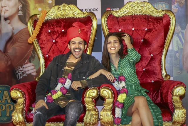 Kartik Aaryan and Kriti Sanon pose for a photograph during the trailer launch of their upcoming film Luka Chuppi. (PTI)