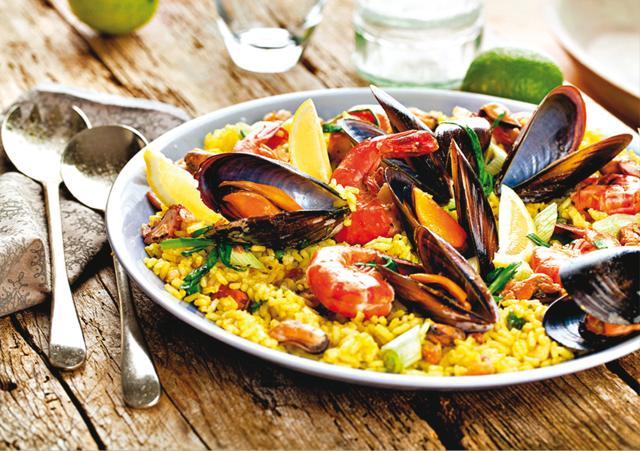Paella comes from the rice dishes of Arab cuisine, and the Arabs planted rice in Spain (Shutterstock)